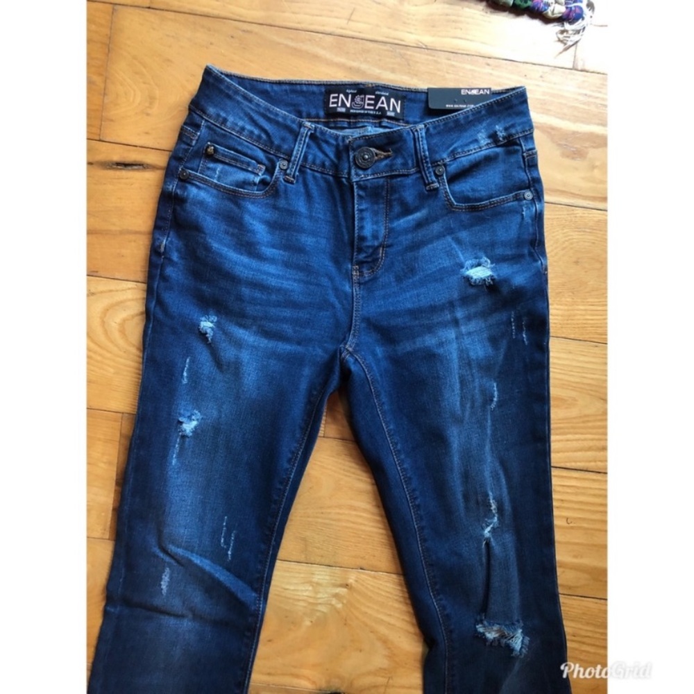 Distressed Mid Rise Flares - Picture 2 of 3